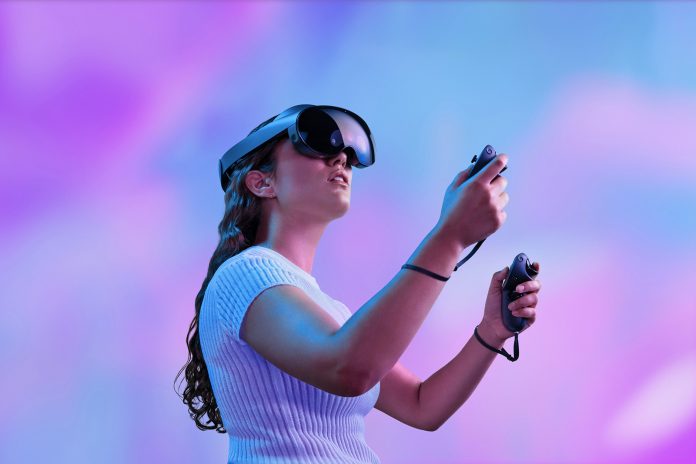 Woman wearing Meta Quest Pro VR headset